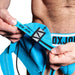 Oxjok Slingjock - Upthrust Slider Jockstrap - Ingebouwde Cockring - Met opbergvakje - Pool Blue-Erotiekvoordeel.nl